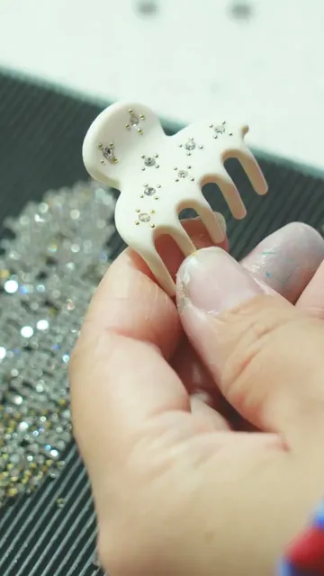 Hand-embedding rhinestones