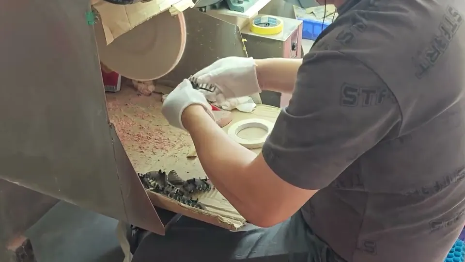 Machine polishing the carved blanks