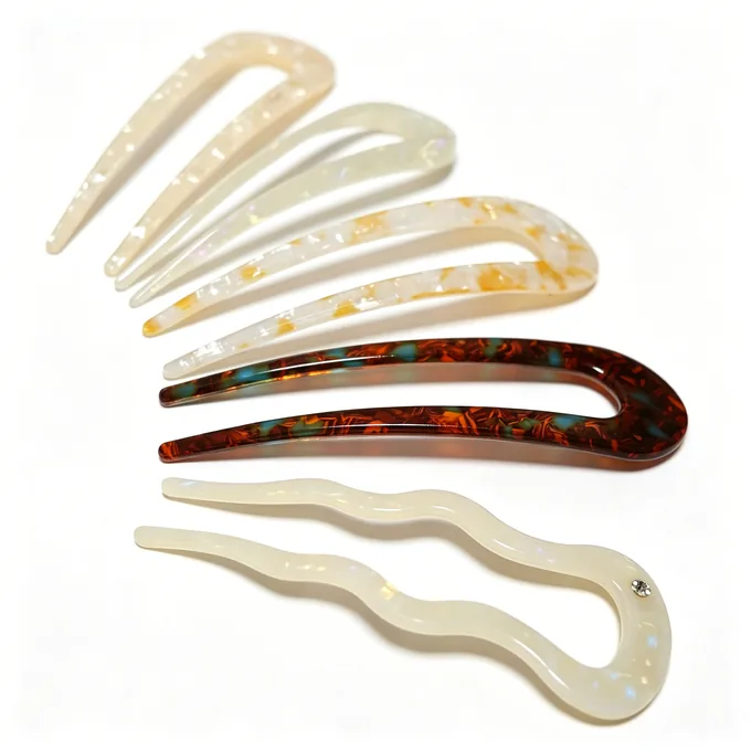 Cellulose acetate U-shaped hair fork designs shown in rounded and pointed silhouettes