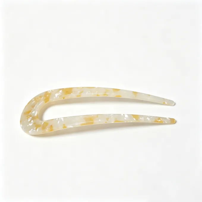 Smooth pearl cellulose acetate hair fork with a hand-polished two-prong body