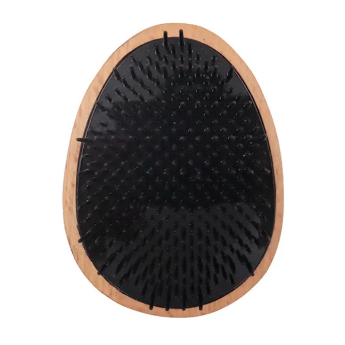 Egg-shaped bristle pad packed with soft nylon detangling bristles
