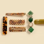 Tortoiseshell cellulose acetate hair barrette with a hinged spring bar