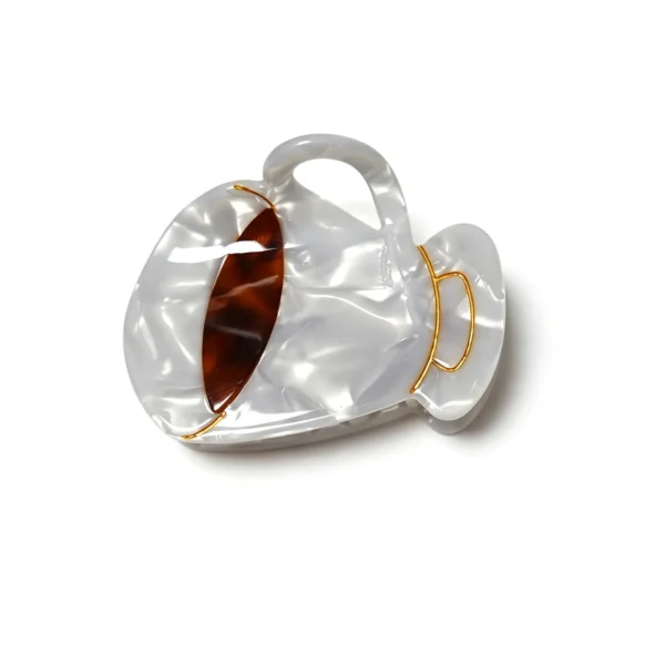 Sculptural loop acetate claw clip in pearl and tortoiseshell, main product view