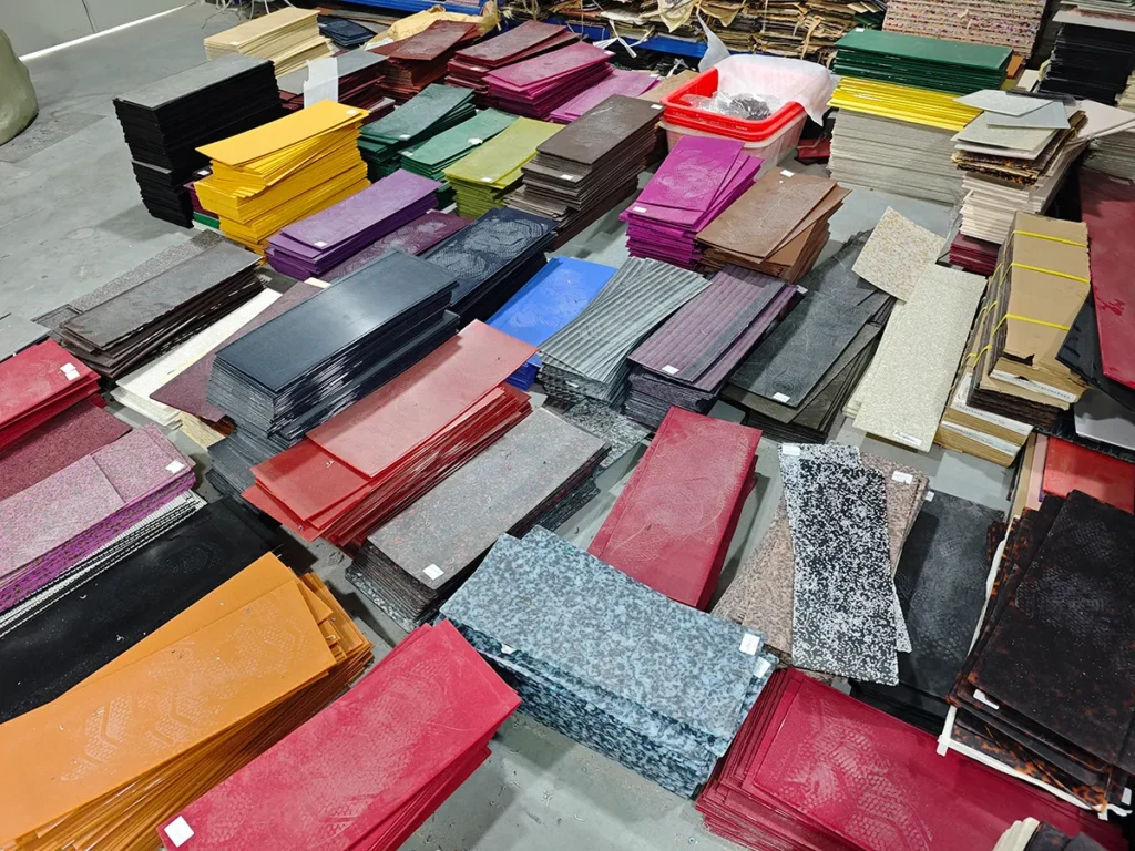 Cellulose acetate sheets in dozens of patterns laid out for selection