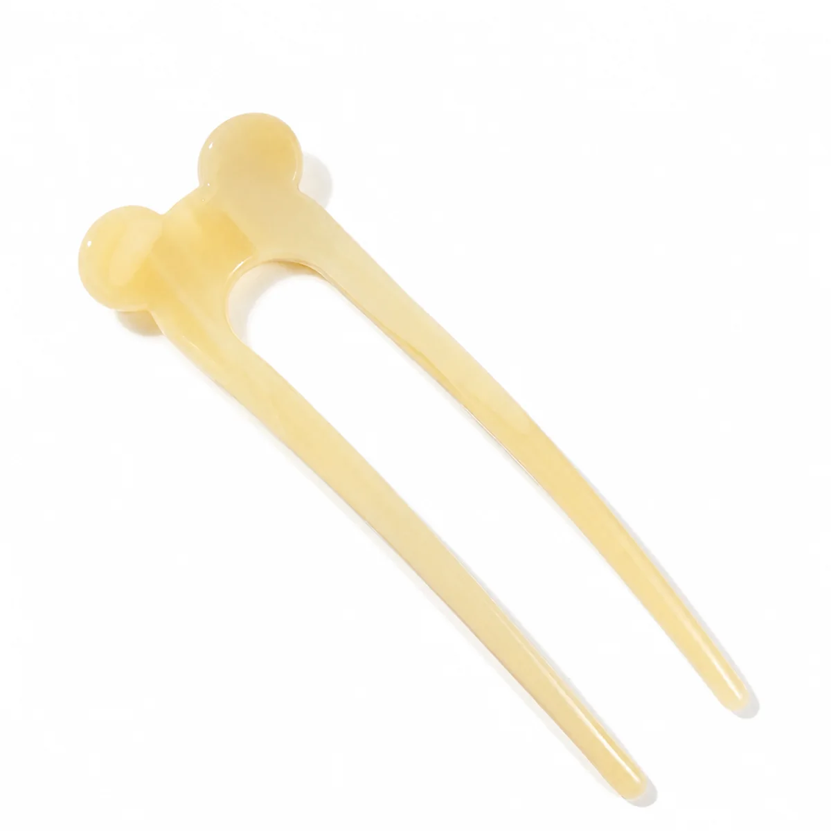 Single cream acetate hair fork with a two-ball head