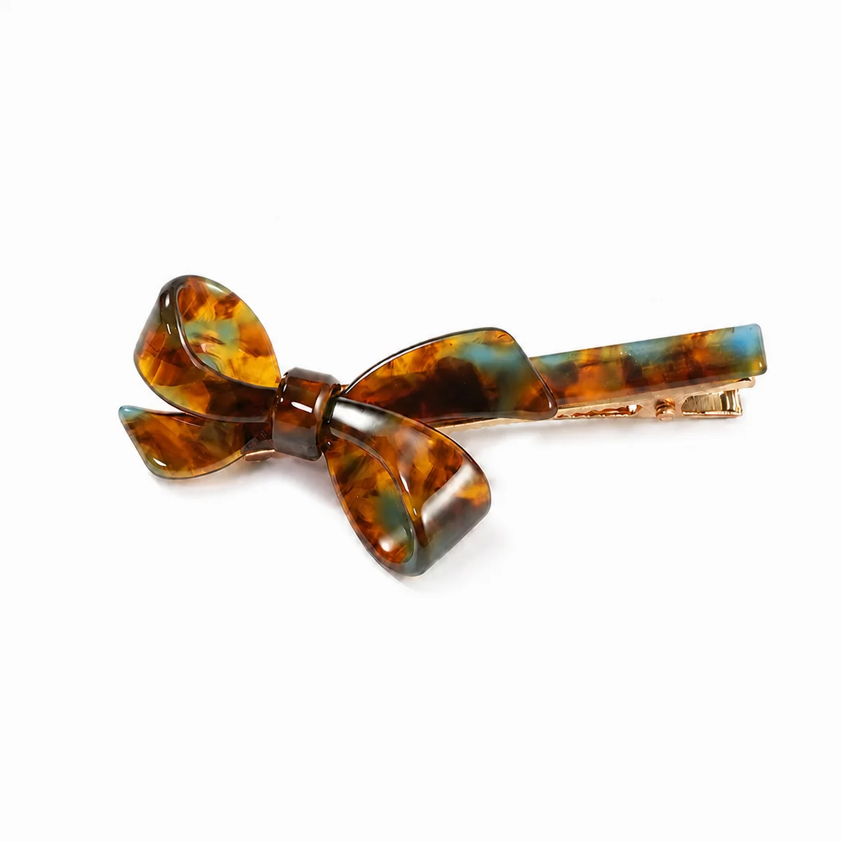 Single tortoiseshell acetate bow clip with a sculpted three-dimensional knot