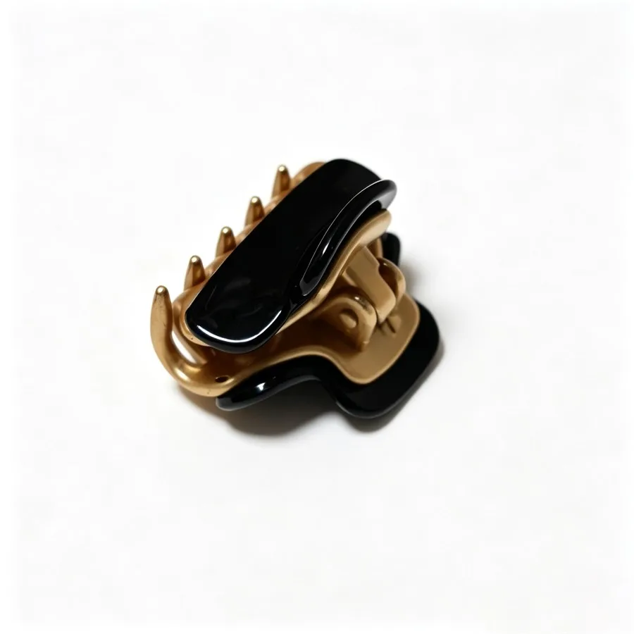 Onyx acetate claw clip with sculptural gold metal hardware