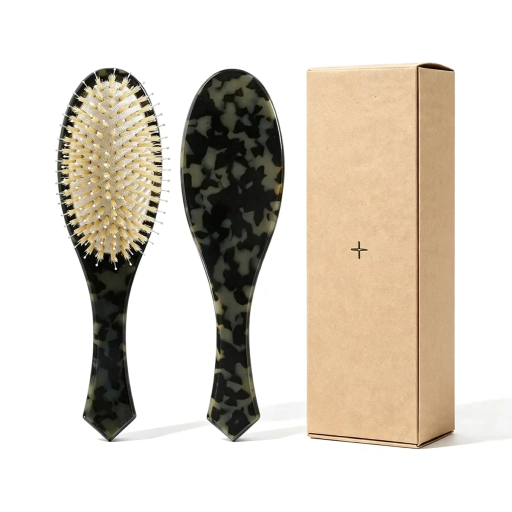 Tortoiseshell comb with a velvet drawstring pouch