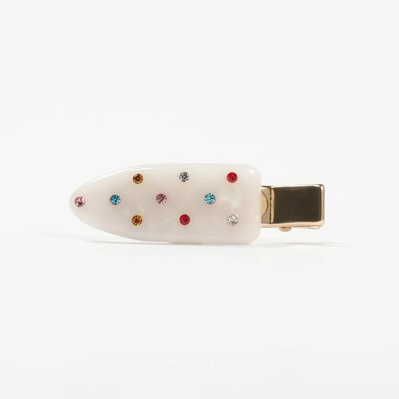 Pearl white acetate duckbill clip with multicoloured crystal scatter
