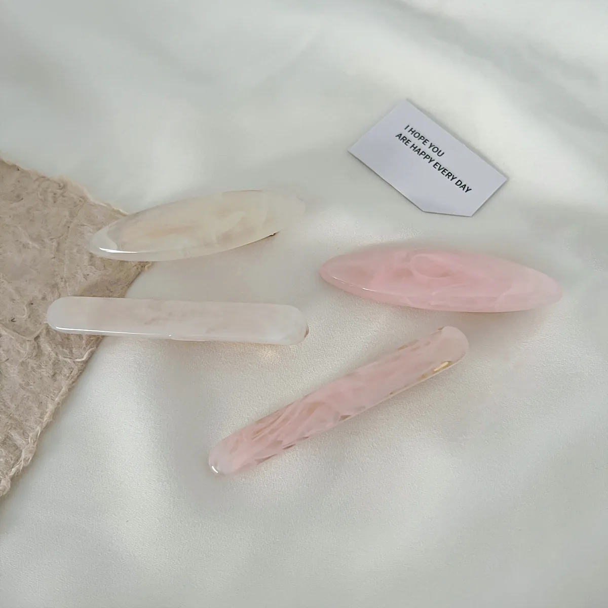Pearl white, tortoiseshell and blush pink French barrettes in three shapes