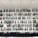 Sample room wall in our factory displaying several hundred hair brush and comb styles