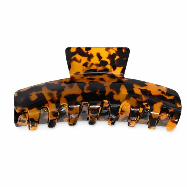 Tortoiseshell acetate banana claw clip on a white background, showing the full row of interlocking teeth along the 11.5 cm body