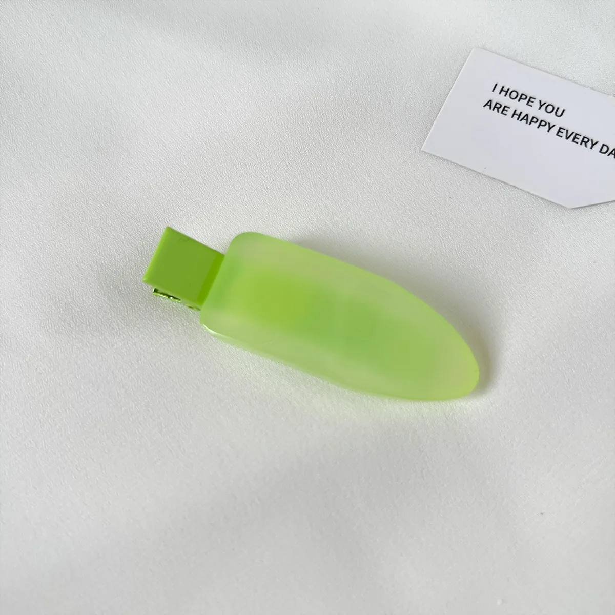 Pink frosted acetate duckbill clip, colour-matched spring base