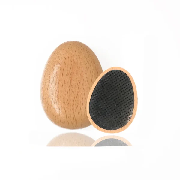 Two handle-free pocket detangling brushes on a white background, one turned to show the beech back and the other the bristle pad