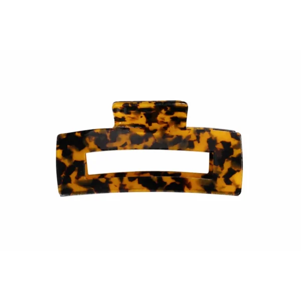 Tortoiseshell acetate rectangular frame claw clip on a white background, showing the open geometric frame and the interlocking teeth along the lower bar