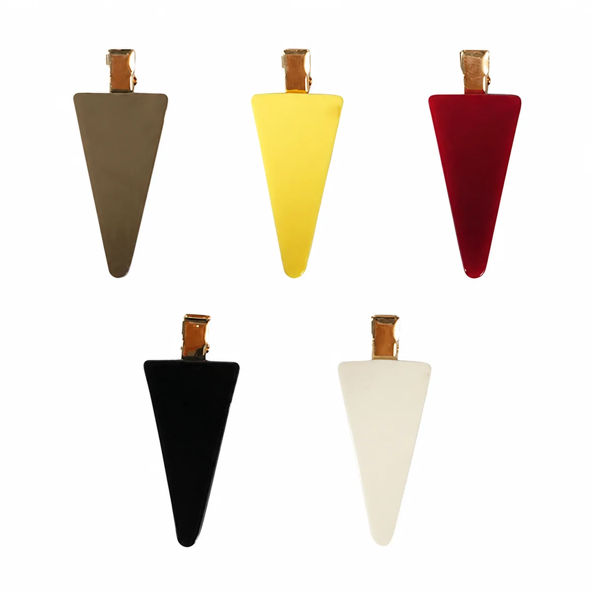 Five triangle acetate side clips upright in taupe, yellow, wine, black and cream