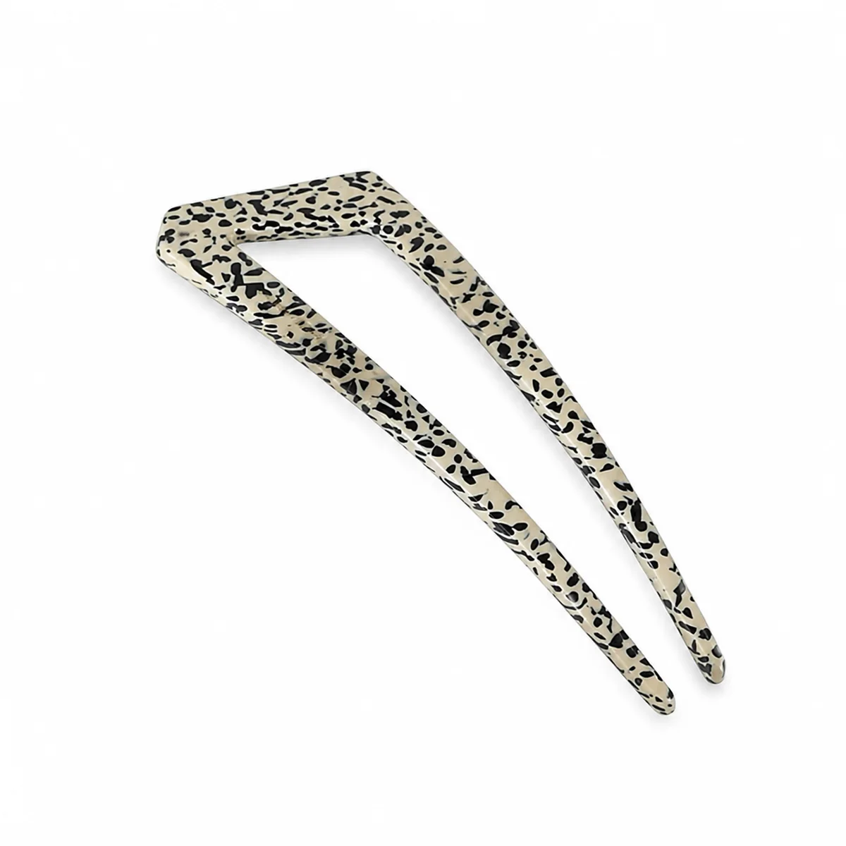 Single dalmatian-print acetate hair fork, black spots on cream