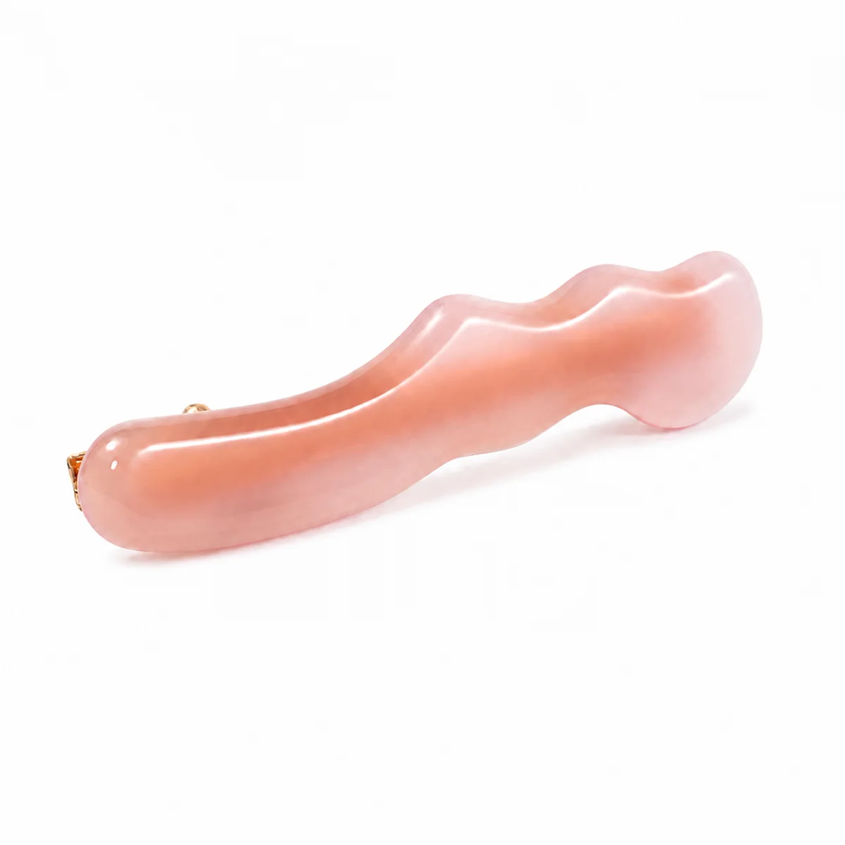 Single pink wavy acetate snap clip with a rippled edge