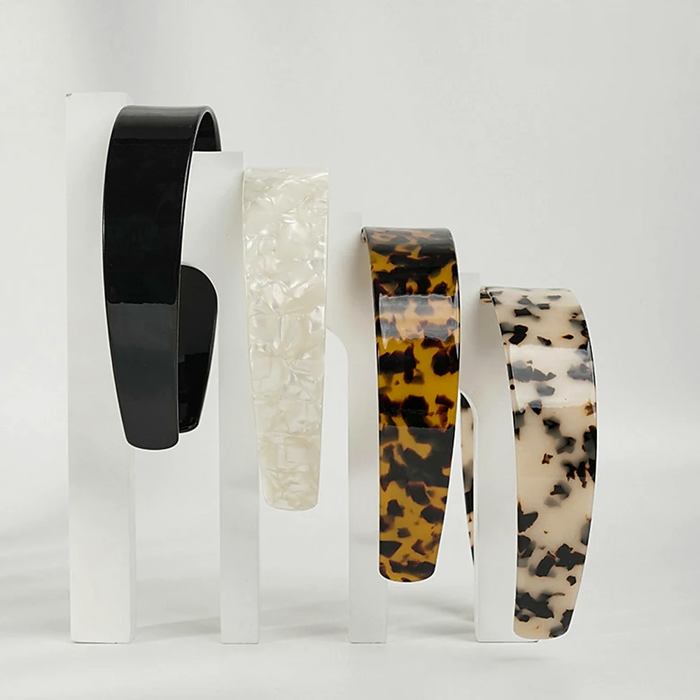 Four colourways of the wide acetate headband with teeth