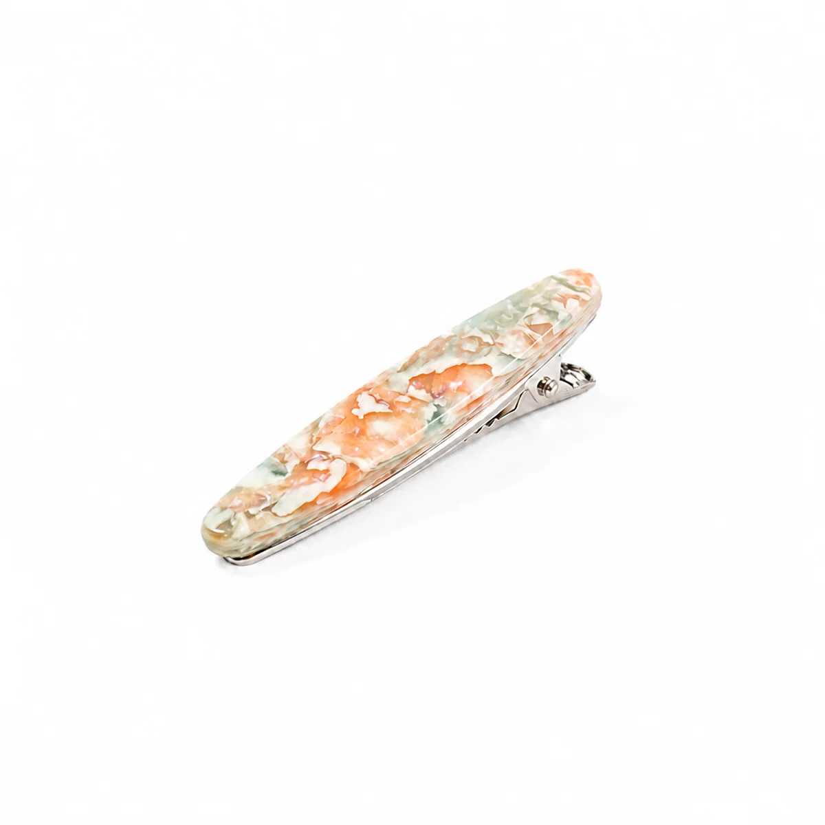 Single peach floral acetate duckbill clip on a silver-tone base