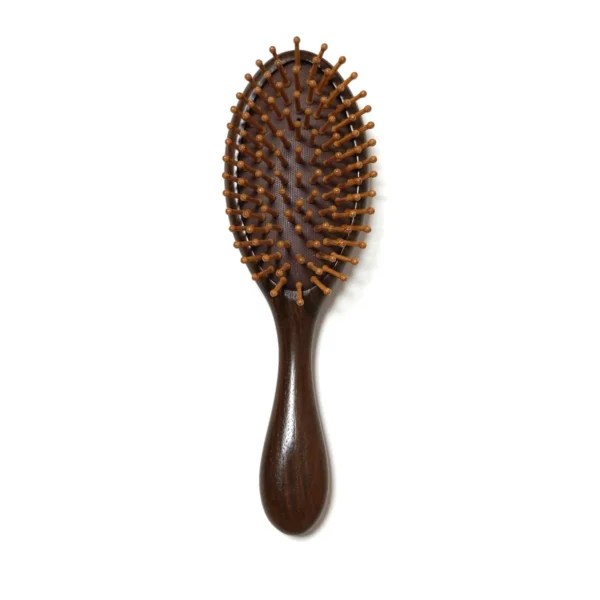 Dark walnut oval cushion hair brush with ball-tipped wooden pins, view 01