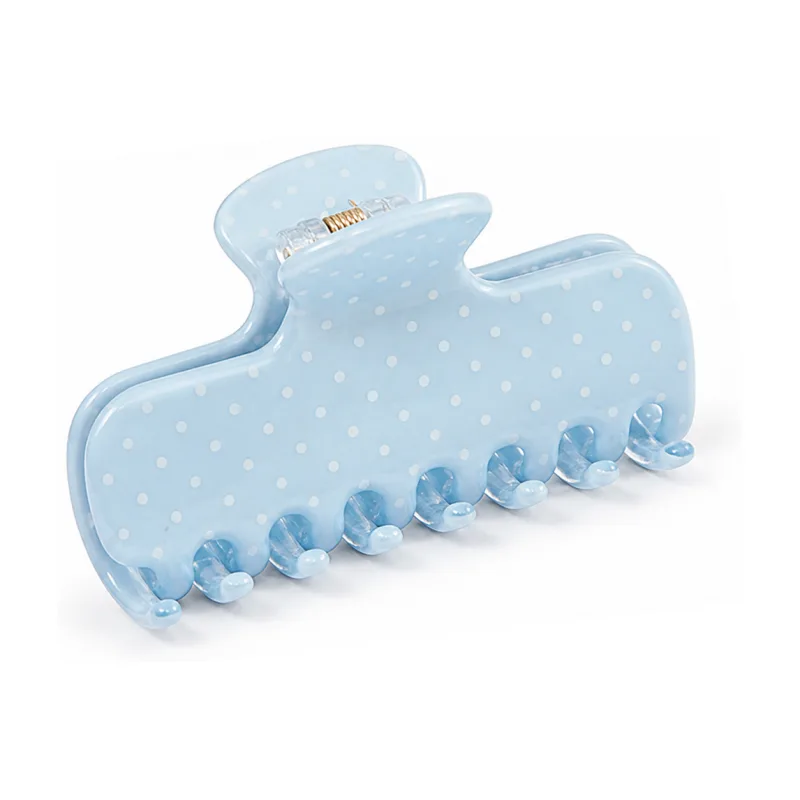 Sky blue acetate banana claw clip printed with white polka dots