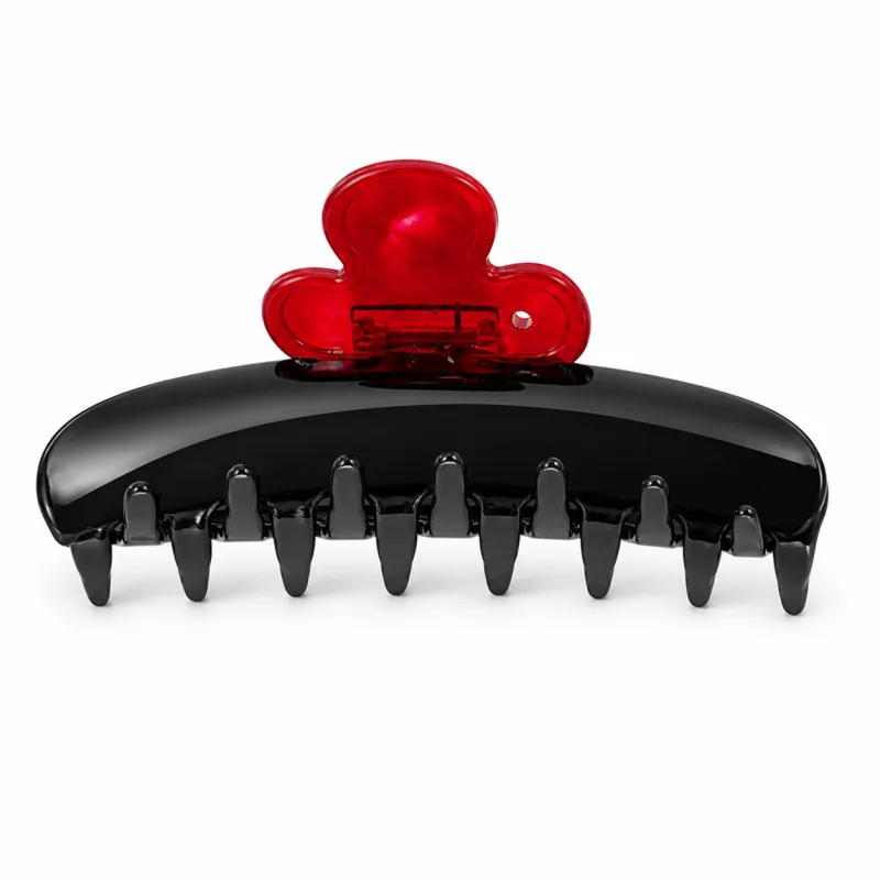 Gloss black acetate claw clip topped with a red acetate blossom