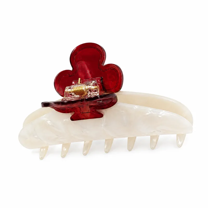 Ivory pearl acetate claw clip topped with a red acetate blossom
