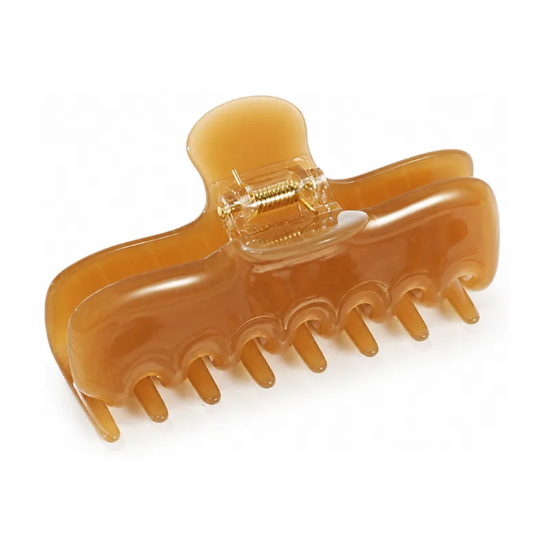 Translucent honey amber acetate claw clip with thick jelly teeth