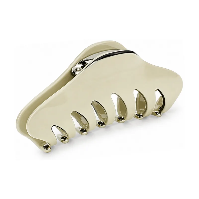 Large ivory acetate shark claw clip with gold-tipped teeth
