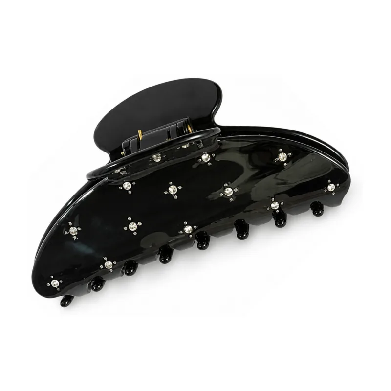 Gloss black acetate shark claw clip scattered with starburst rhinestones