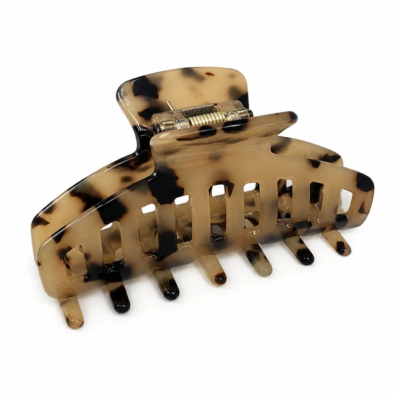 Wide blonde tortoiseshell acetate banana claw clip with long teeth