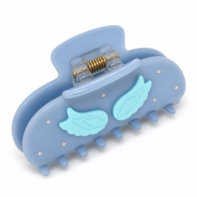 Periwinkle acetate claw clip with mint green wings and crystal scatter